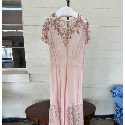 Short sleeve full length dress with lace inserts on skirt and embellished top