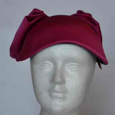 Satin calot with large bow at back