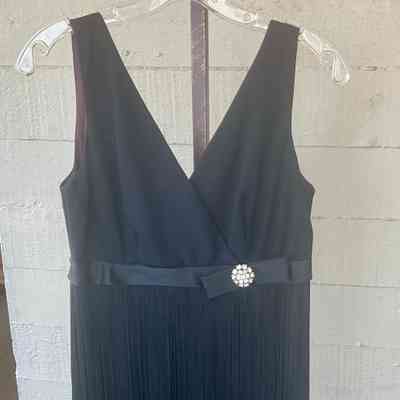 Cocktail dress with fringe overlay on skirt