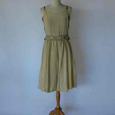 Sleeveless knee length silk dress with silver embossed bodice and gathered skirt