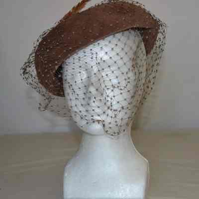 Wool felt bumper style hat with full face veil and feather