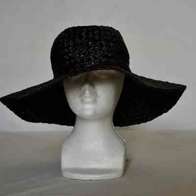 Straw basket weave floppy wide brim hat with indented creased crown