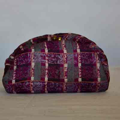 Printed silk clutch bag with kiss lock and mirror compartment