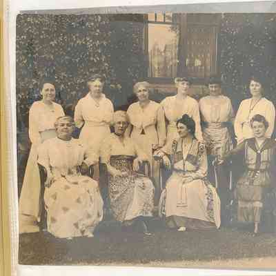 Ebell members, 1916-1918: Standing: Mrs. Fred Betts, Mrs. George P. Thresher, Mrs. George A. Brock, Mrs. Lyman Curtis Blakeslee, Mrs. Henry Van Bergen, Eleanor S. Macauly (Mrs. George A. Macauly), Miss Mattie H. Wilson. 
Seated: Mrs. Lewis Clark Carlisle, Mrs. Wiliam Luke Jones, Mrs. Chester C. Ashley (President), Mrs. Grantland S. Long, and Mrs. Walter Harrison Fisher