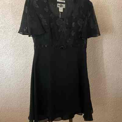 Short sleeve mini dress with floral empire waist bodice, ribbon trim at waist