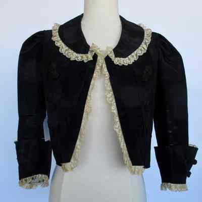 Moiré short jacket with peter pan collar, cuffed sleeves and lace trim