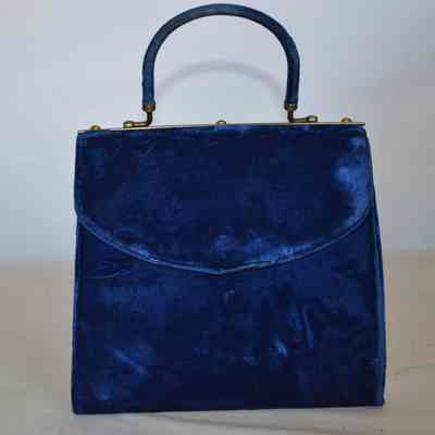 Velvet rigid flap bag with gold/brass hardware, blue handle