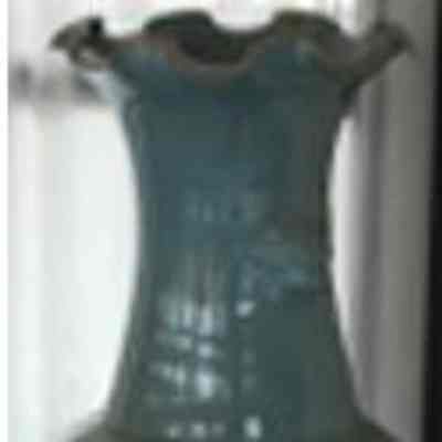 Blue vase with ruffled rim