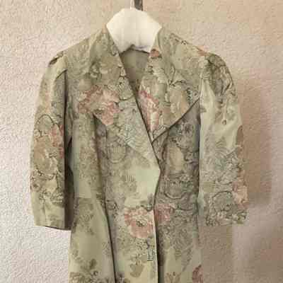 Floral brocade double breasted coat dress with 3/4 sleeves and collar
