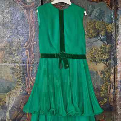 Knife pleated palazzo pants and sleeveless tunic with peplum, trimmed in velvet