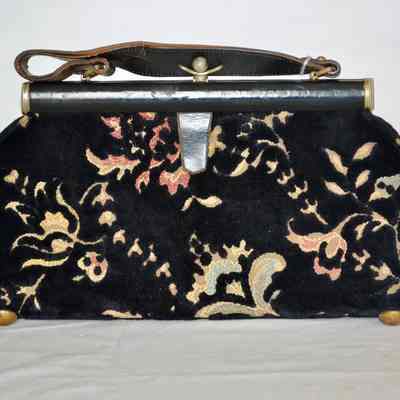 Black tapestry purse with leather trim