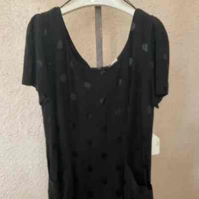 Mini dress with scooped neck, front pockets, short sleeves