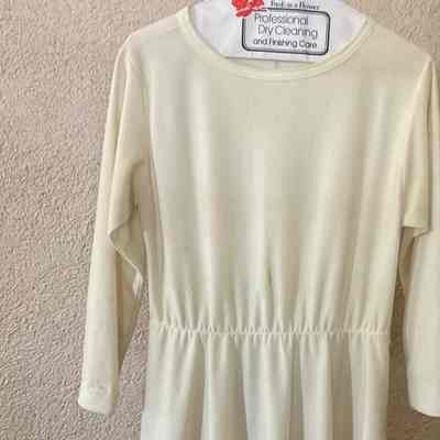 Long sleeve jersey dress with gently scooped neck
