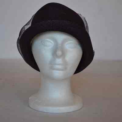 Straw cloche with tulle on brim
