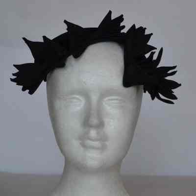 Asymmetrical velvet calot with grosgrain bows at front