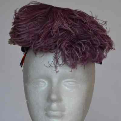 Velvet calot with plumes at front and velvet flowers