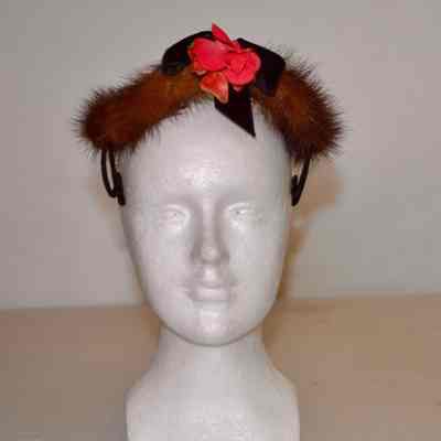 Mink open crown cocktail hat with pink rose and black velvet ribbon