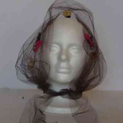 Tulle bonnet with floral appliqués