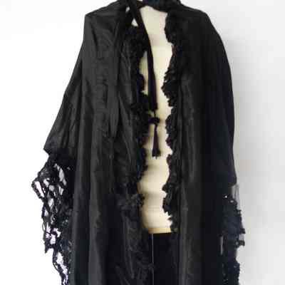 Taffeta long coat with fringed tie and chiffon trim at sleeve cuffs and hem