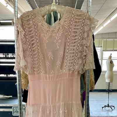 Full length short sleeve lace embellished dress with dotted Swiss waist panel and tiered skirt over matching under dress