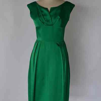 Satin sleeveless cocktail dress with bow at back waist