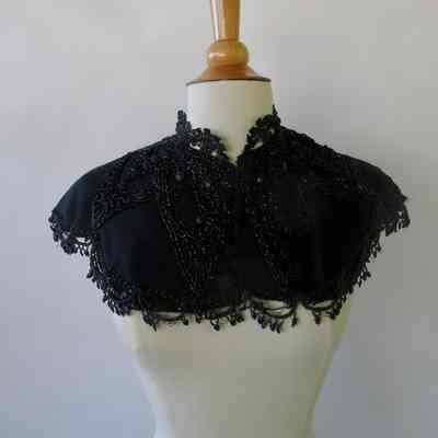 Short scallop edge capelet with beaded embellishment and Mandarin collar