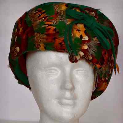 Felt Cossack hat with multi feather covered brim with bow