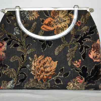 Tapestry purse with clear lucite handle, silver detailing, black fabric lining, zipper pocket