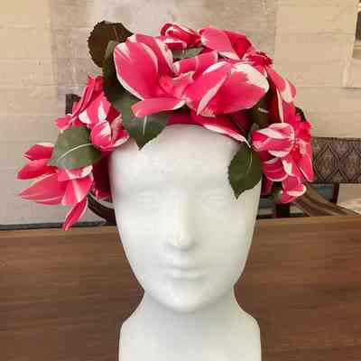 Mesh hat covered in pink and white variegated flowers and leaves