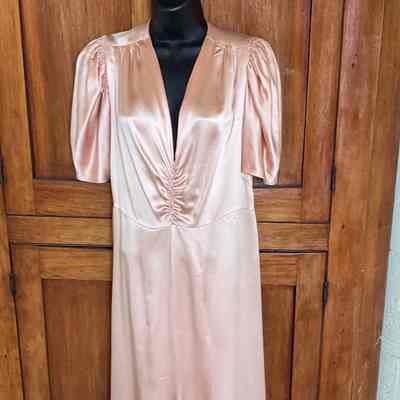 V-neck short sleeve charmeuse floor length dress with smocking detail