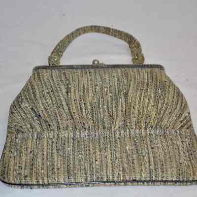 Fabric bag with silver hardware, kiss lock, self handle