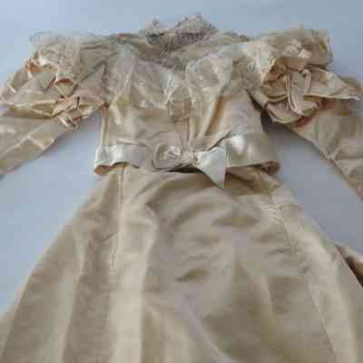 High neck leg of mutton sleeve satin bodice and satin full length skirt