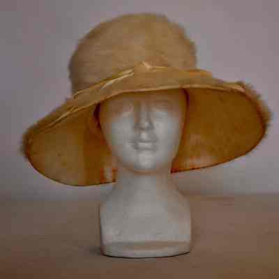 Fur mushroom hat with cream satin ribbon and bow