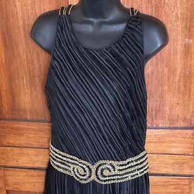 Fortuny style pleated halter top evening dress with beaded belt and straps and evening jacket
