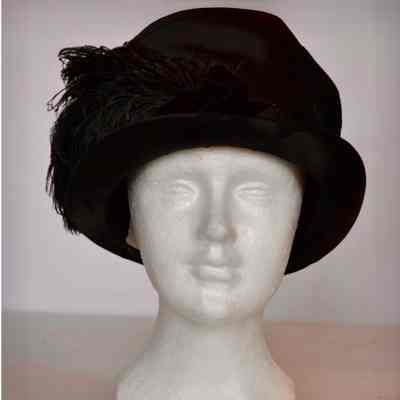 Silk burnout velvet cloche with brim and large plume