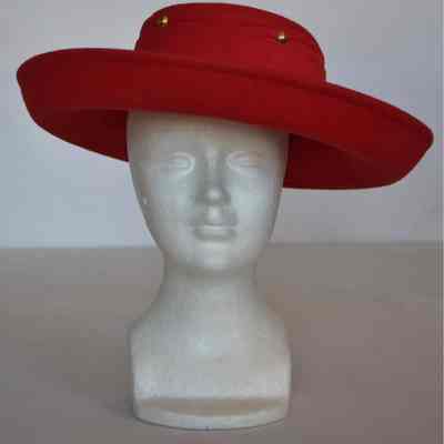 Upturned wide brimmed felt hat with wide gold studded hat band