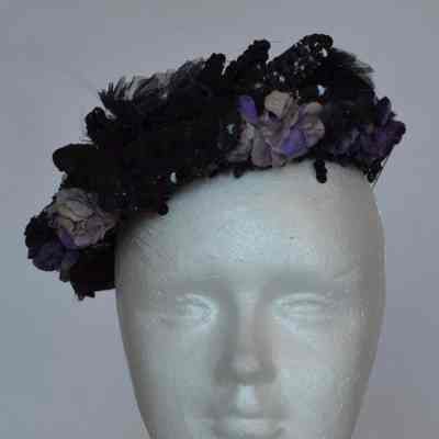 Embellished calot with purple faux flowers