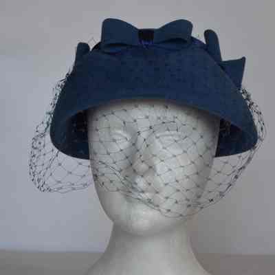 Velour lampshade style hat with 3 self bows, net veil