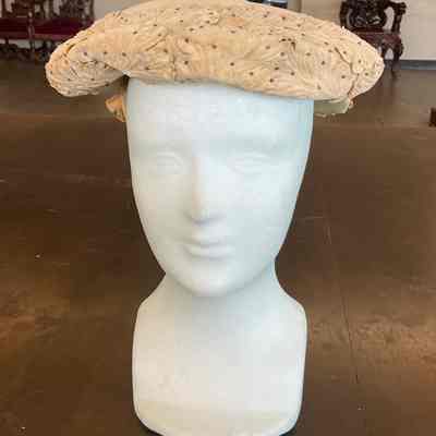 Velvet pancake style hat with embossed velvet scalloped appliqués with tiny seed beads