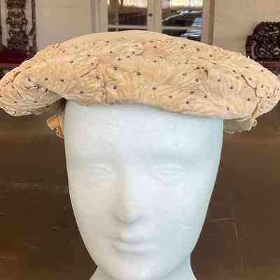 Velvet pancake style hat with embossed velvet scalloped appliqués with tiny seed beads