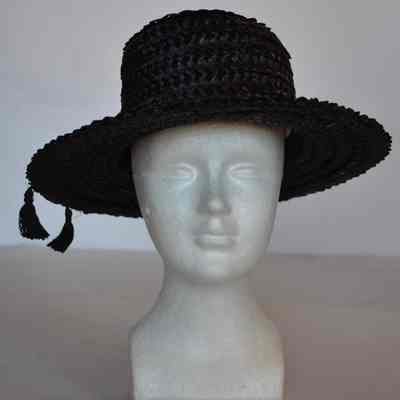 Straw basket weave hat with wide brim, grosgrain band and tassels