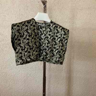 Sleeveless paisley brocade bolero with matching sleeveless dress with ruffle at hem