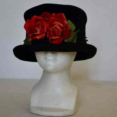 Velvet Mad Hatter hat with black lace trim and roses in front