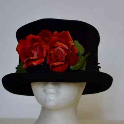 Velvet Mad Hatter hat with black lace trim and roses in front