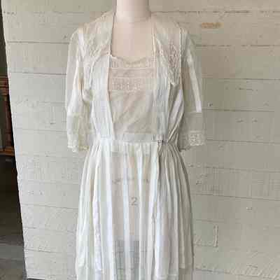 Short sleeved dobby striped cotton with lace inserts on yoke, collar and sleeve, tiered skirt