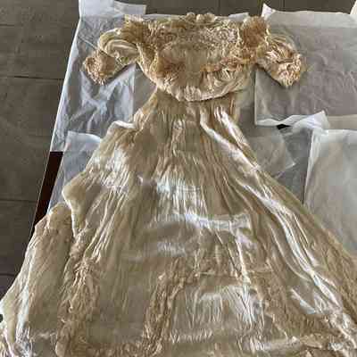 Two piece lace and silk pigeon breast wedding dress