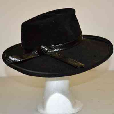 Wide brimmed wool felt fedora with leather band on crown