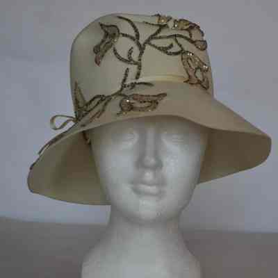 Vagabond style felt hat with beaded flowers and leaves on front crown and brim, narrow hat band