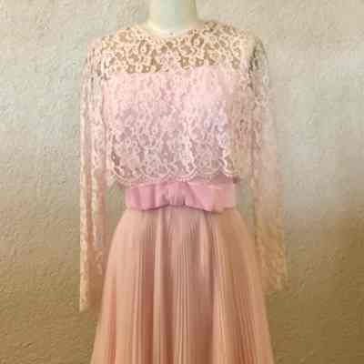 Long sleeve lace overlay top with chiffon base, knife pleated short skirt, velvet sewn on sash and bow