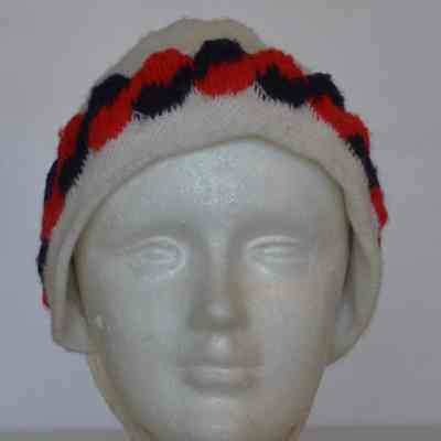 Children's Knit Winter cap with red pom-pom, Navy/Red twist design, with chin tie.
